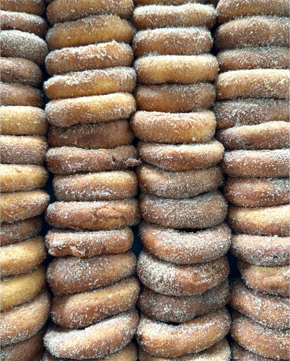 Stacks of apple cider donuts.