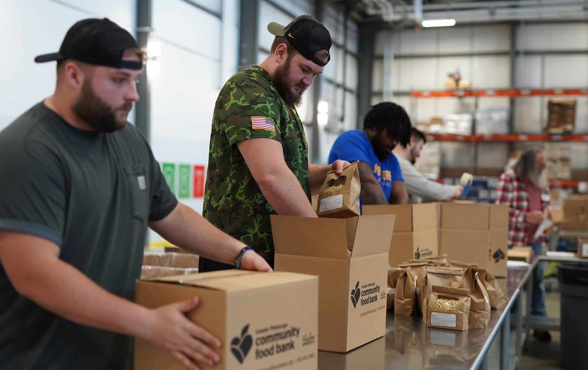 Volunteers packing boxes at GPCFB.