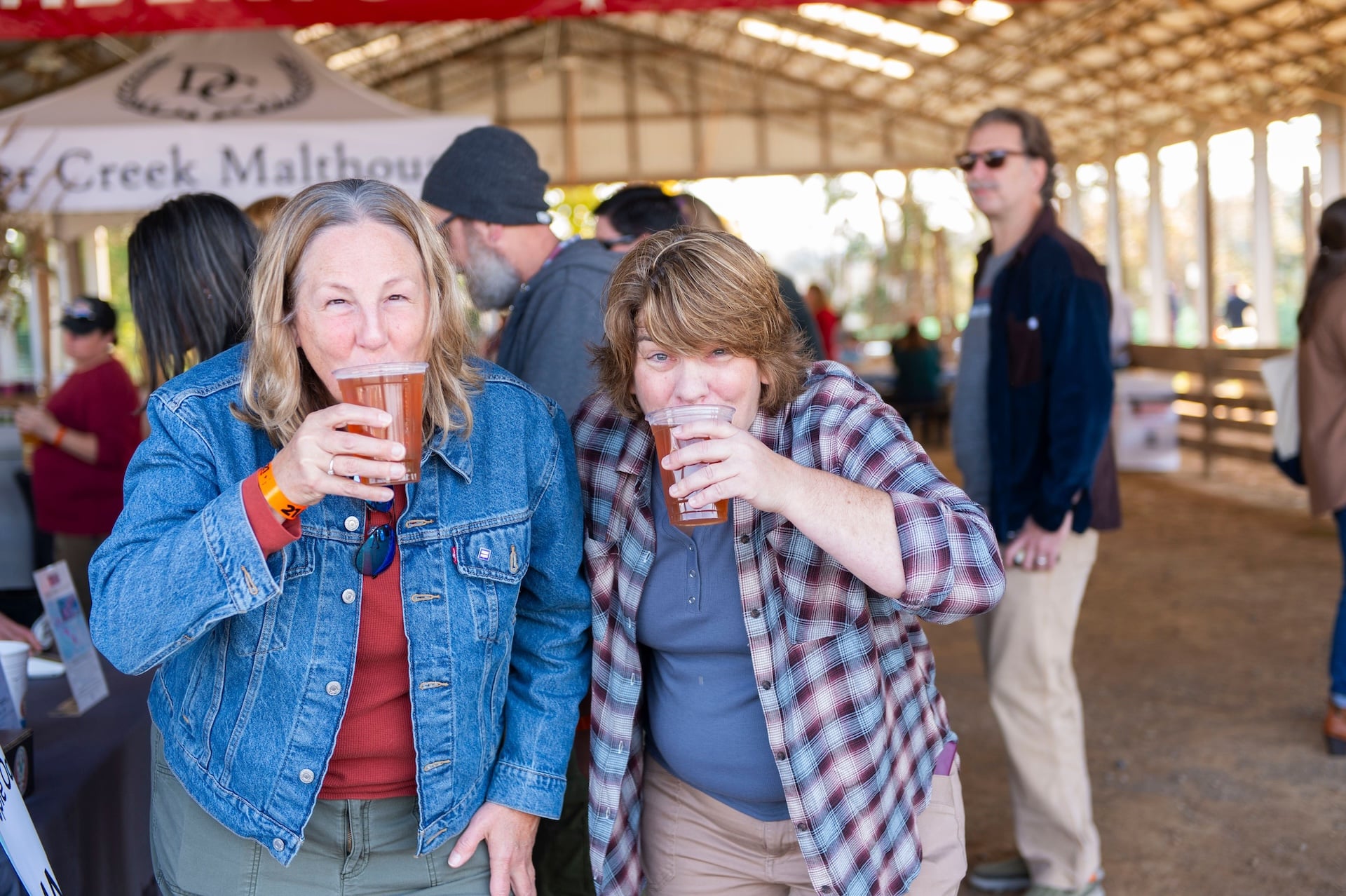 Friends enjoying beer at Good Food Fest.