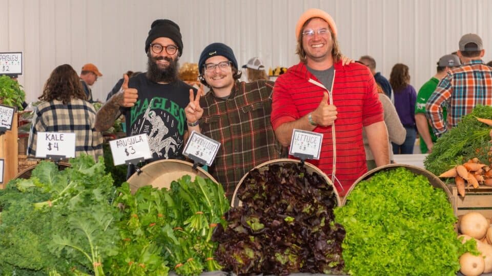 Guys with fresh greens at GFF.