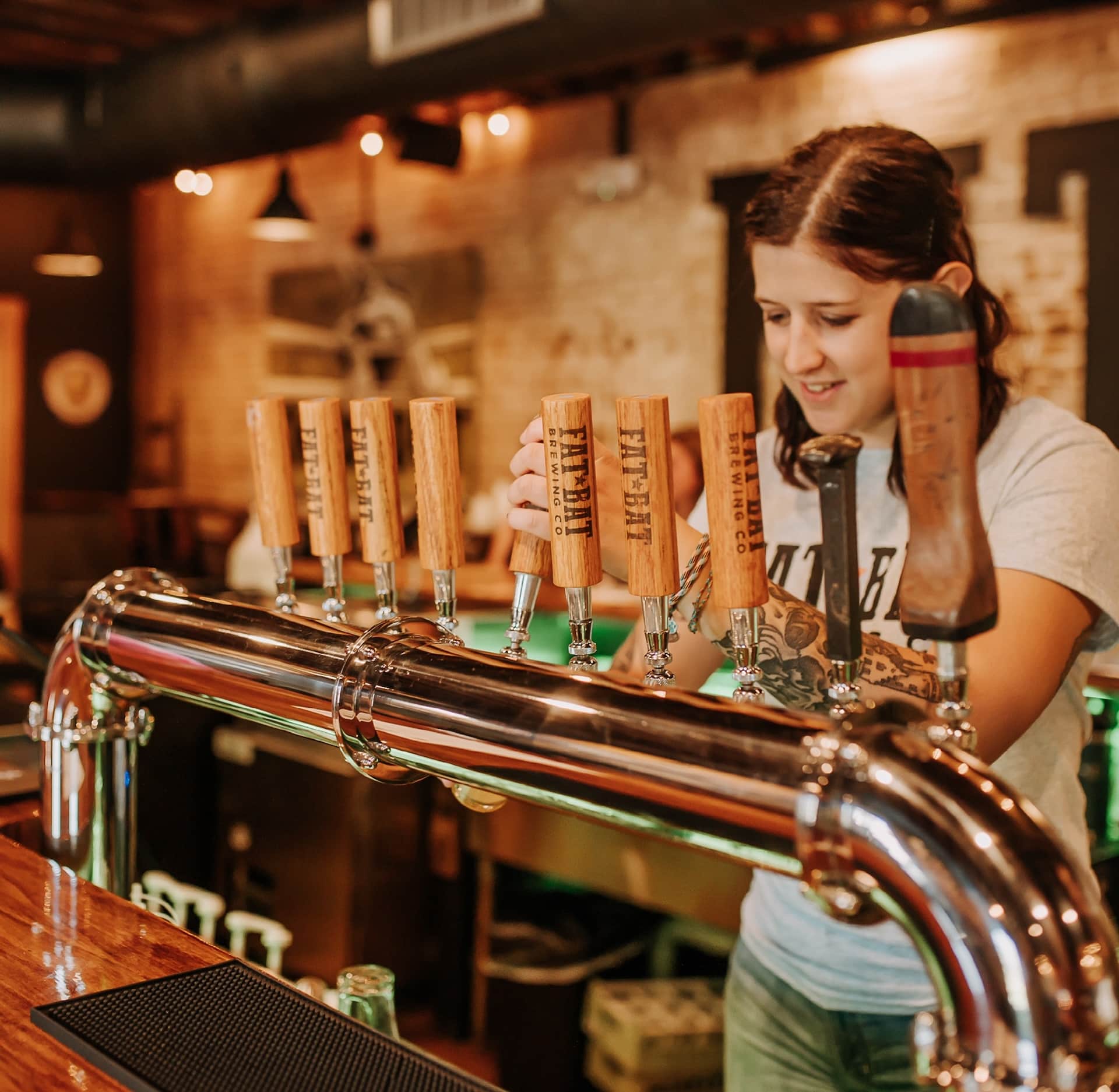 A bartender at Fat Bat Brewing Co.