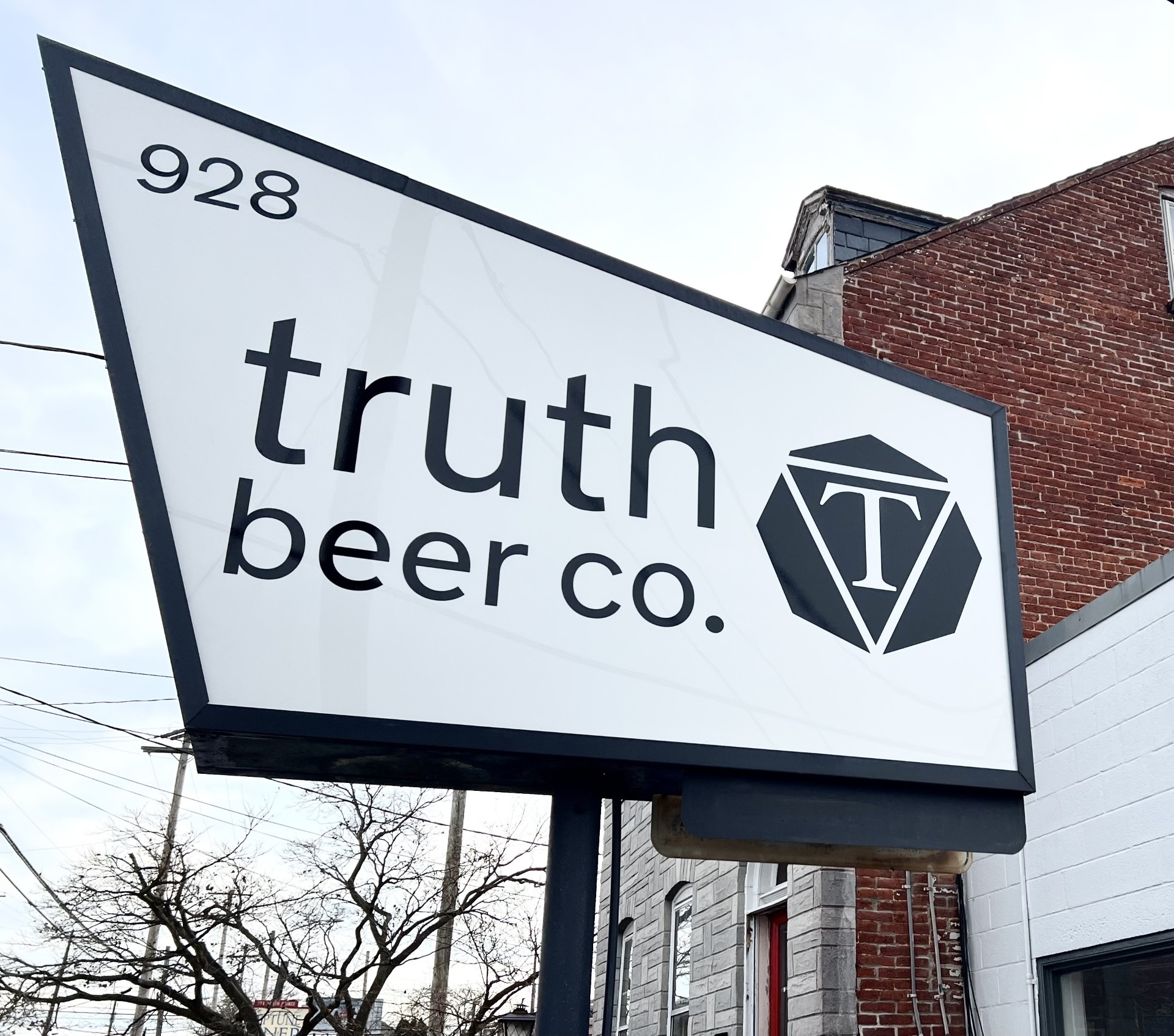 Truth Beer Co. sign.