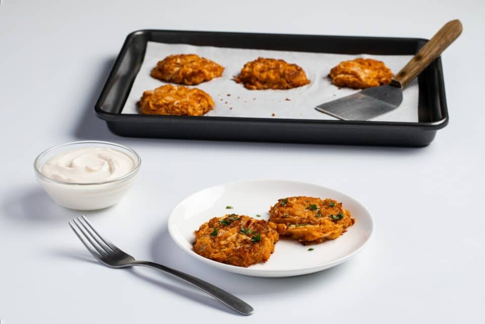 Nourish PA baked onion fritters with lemon garlic yogurt sauce.