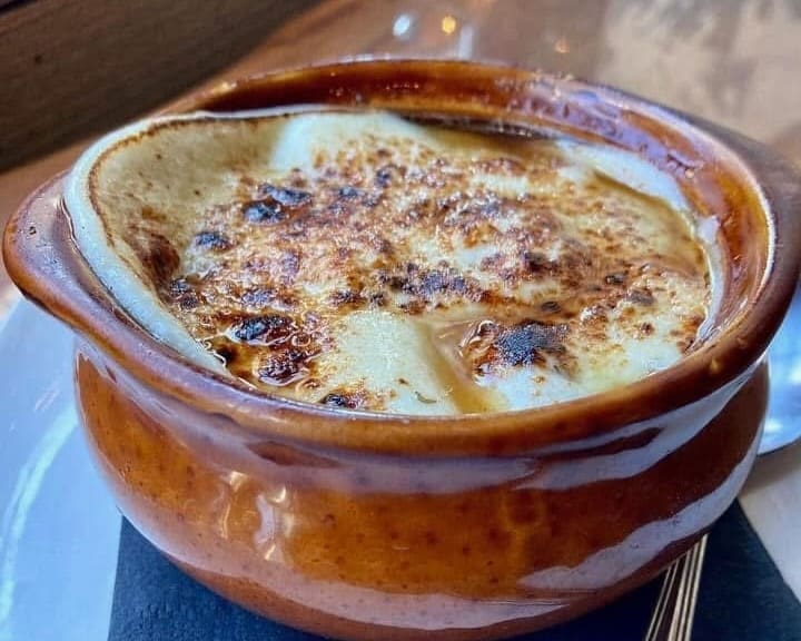 Baked French onion soup at Table 105 in Kane.