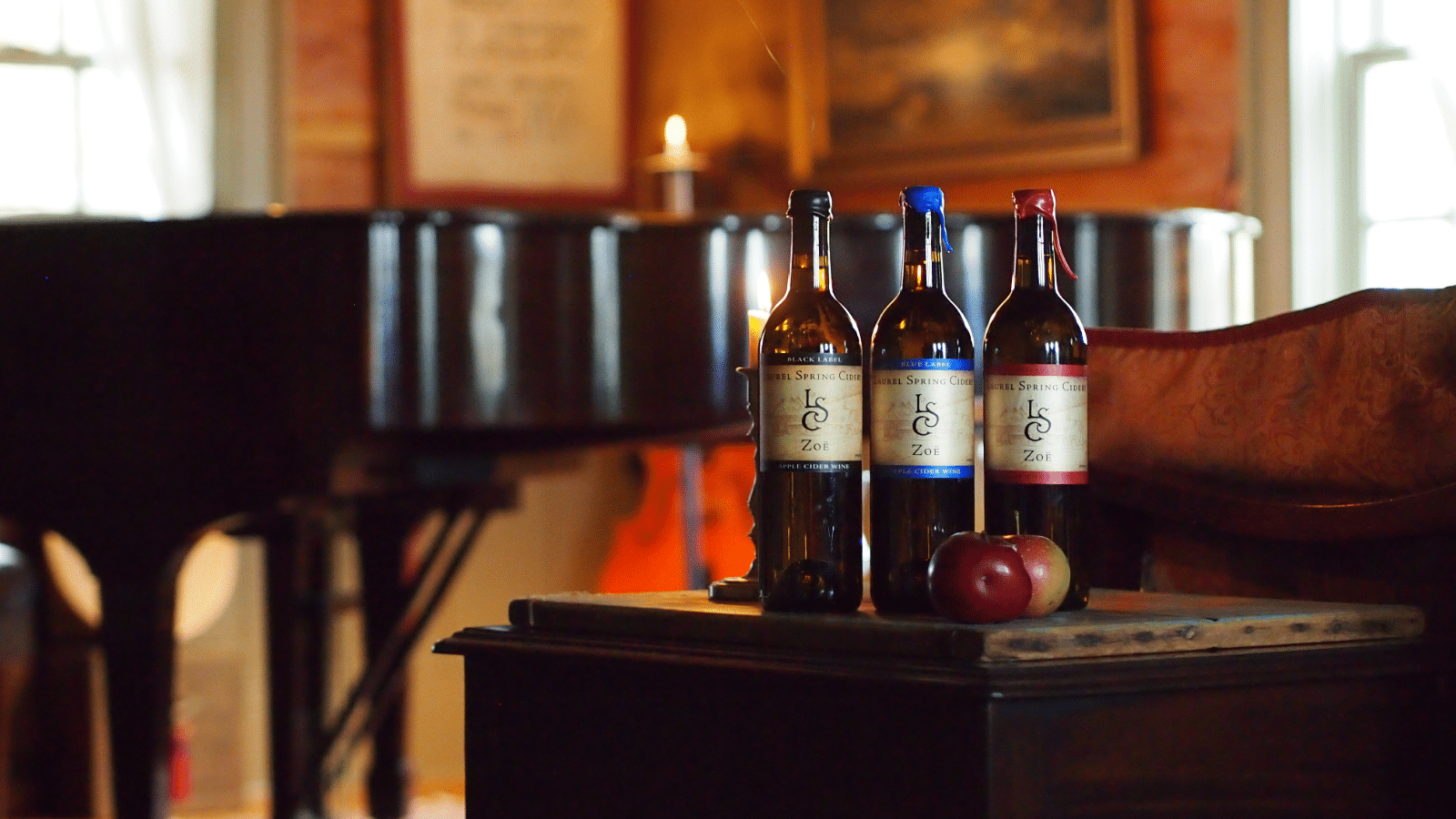 Laurel Spring Cidery wines in an artful room.