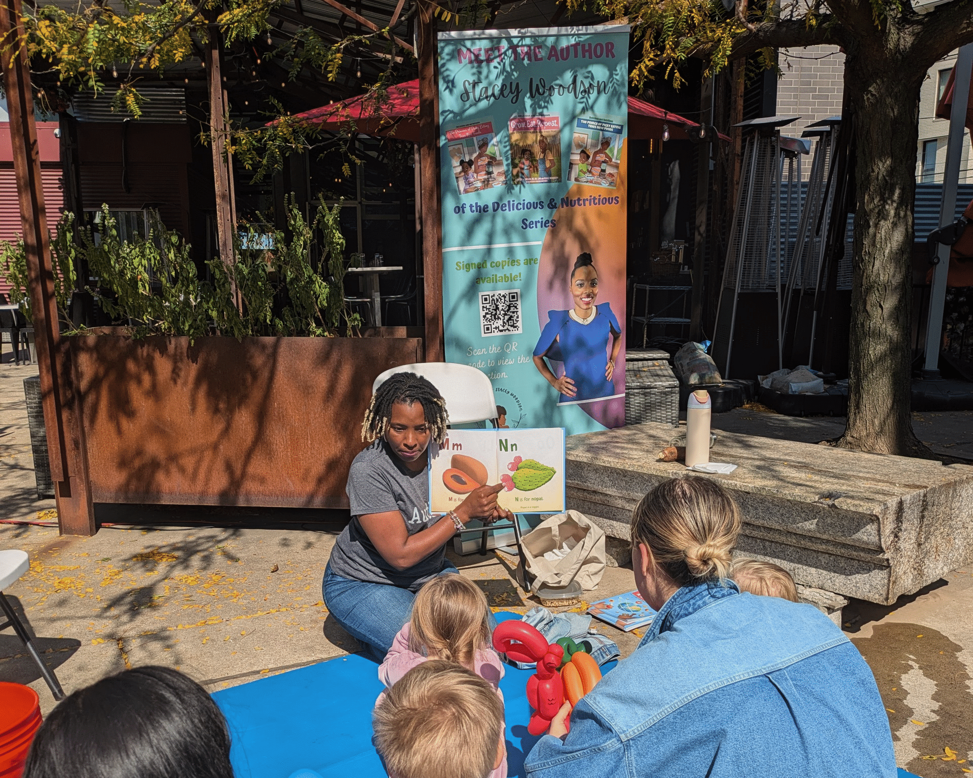 Stacey Woodson doing a meet the author reading.