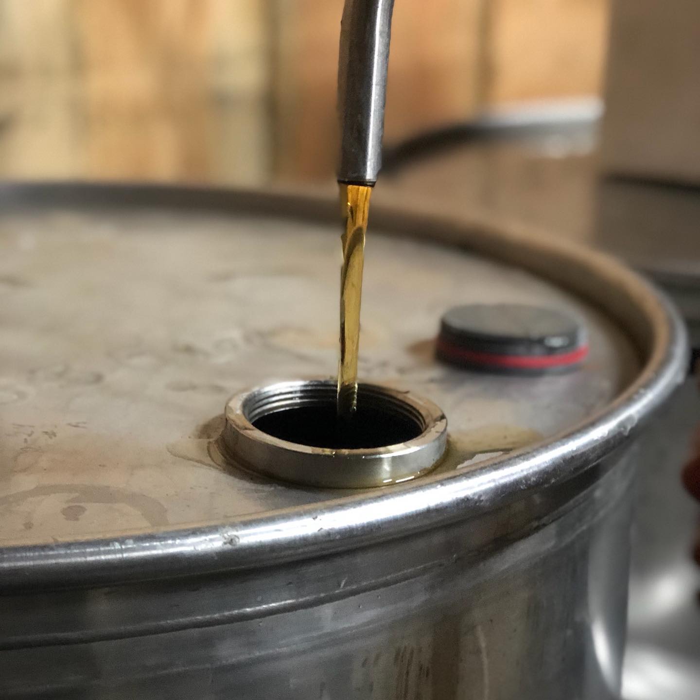 Syrup pouring at Whiskey Hollow Maple.