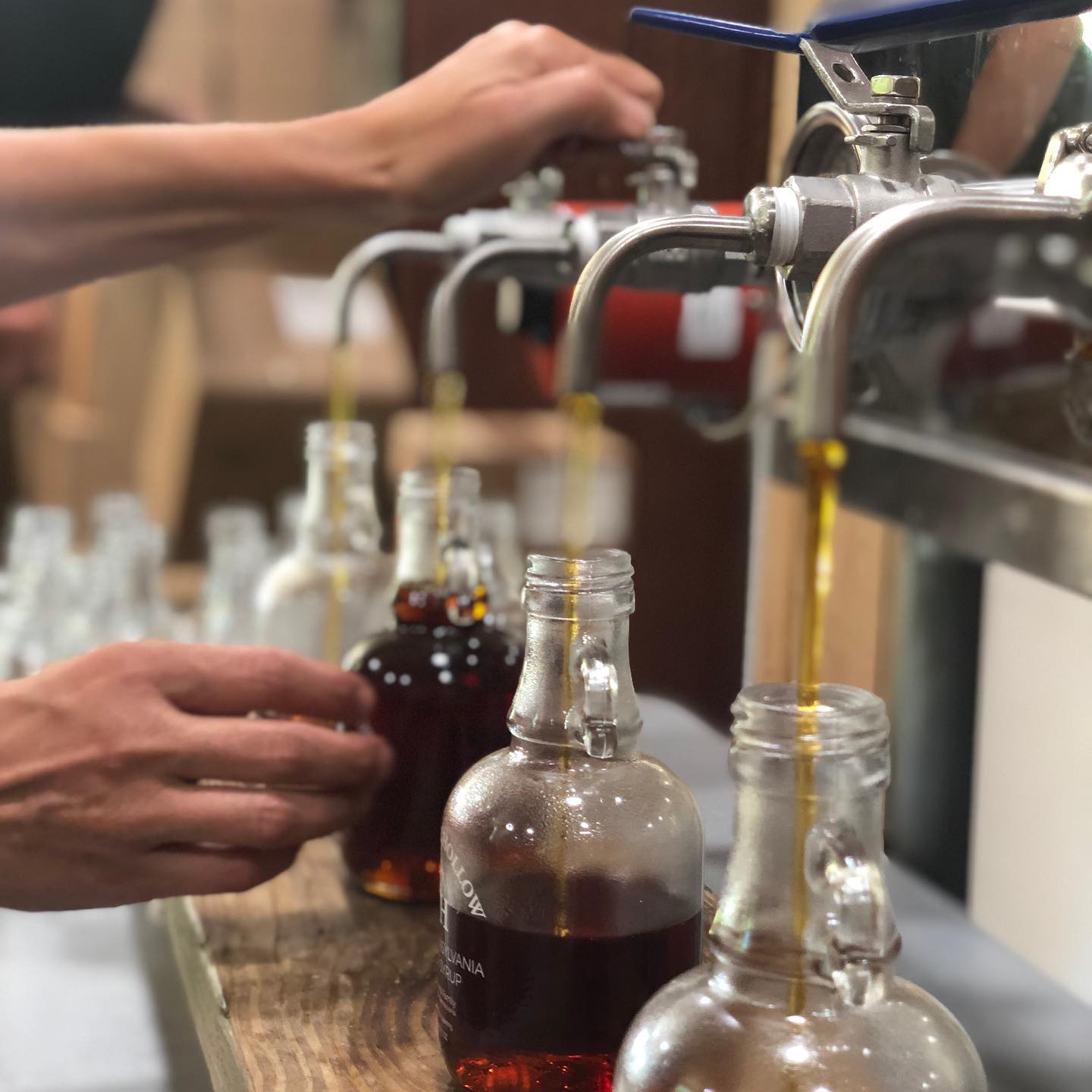 Bottling syrup at Whiskey Hollow Maple.